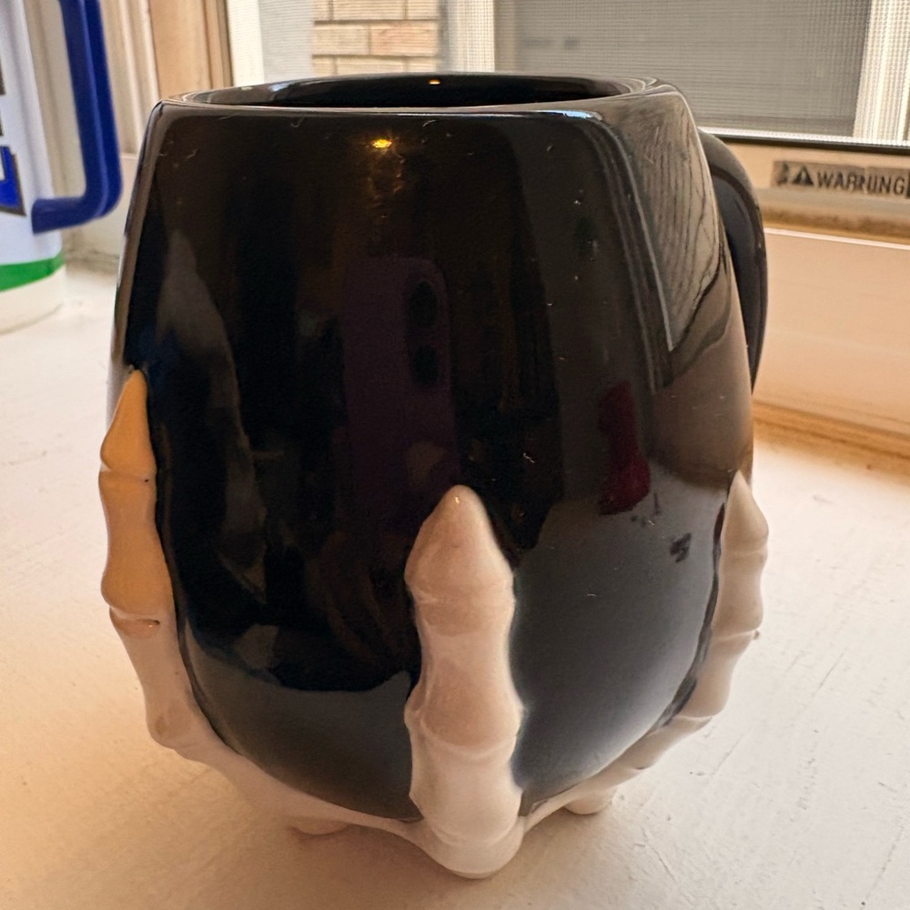 Black Skeleton Hand Mug